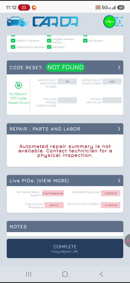 Completed scan report showing emissions readiness monitors, code reset status, and live PIDs